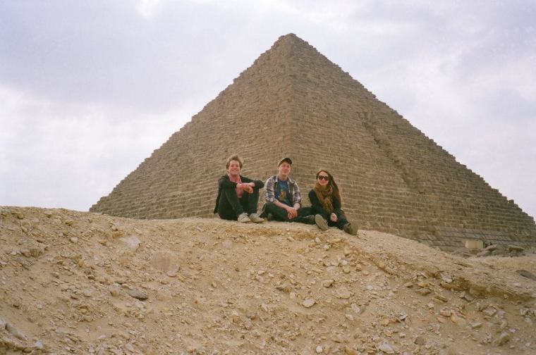 Three Kids out of Five by the pyramids